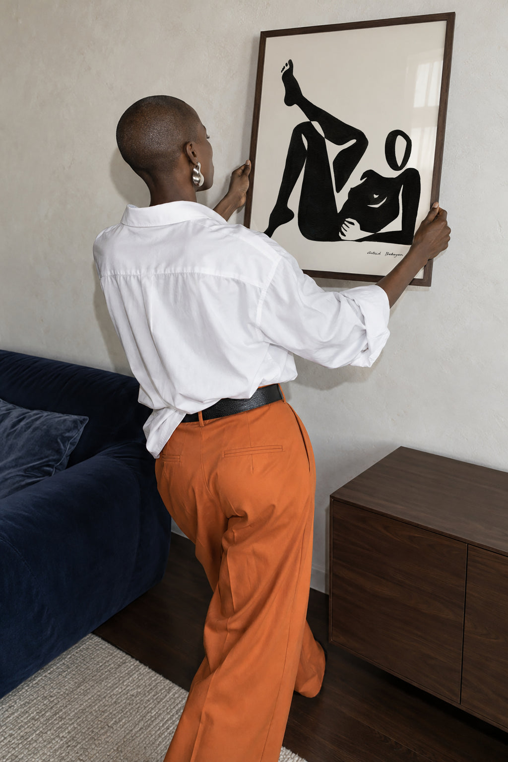 Black figure #8 - Framed poster in an interior