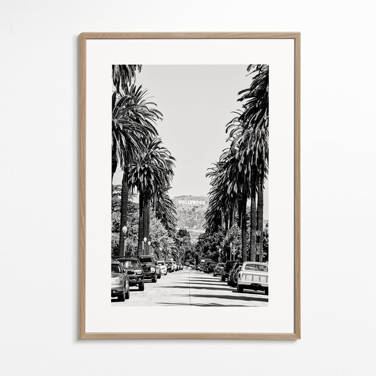Reiseplakat Hollywood Palmenstraße in Schwarzweiß – Oak Frame