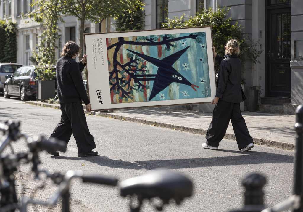 Pajaro en Arbol by Pablo Picasso - Framed canvas in an interior