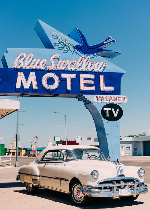 Cuadro vintage de motel y coche clásico