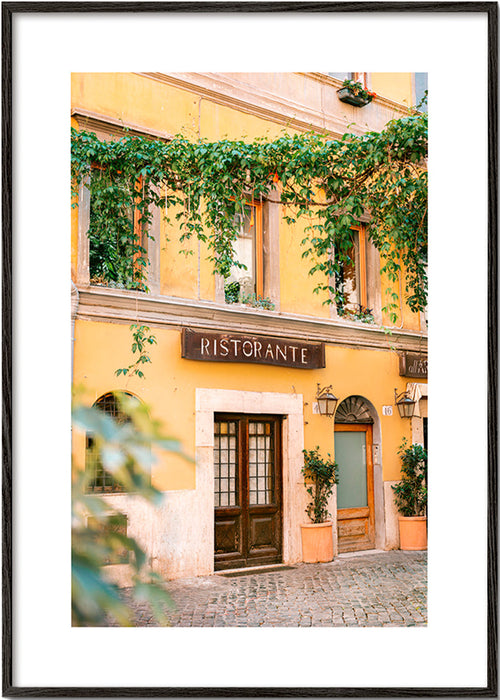 Cuadro de cocina con fachada de ristorante en amarillo – Black Frame