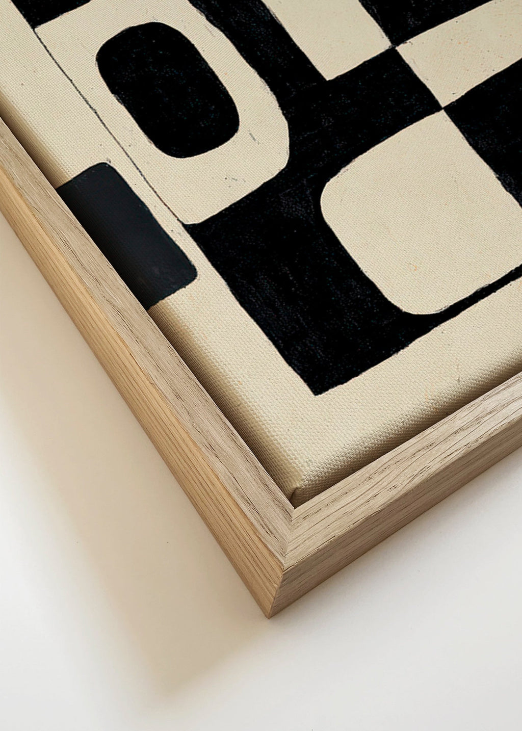 Cuadro geométrico de bloques negros con negativos curvos – Canvas detail