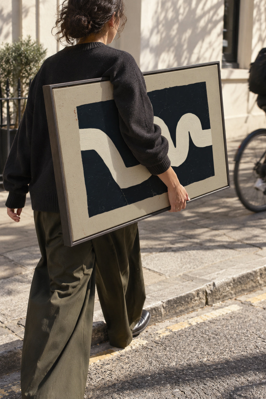 White Curve - Framed canvas in an interior
