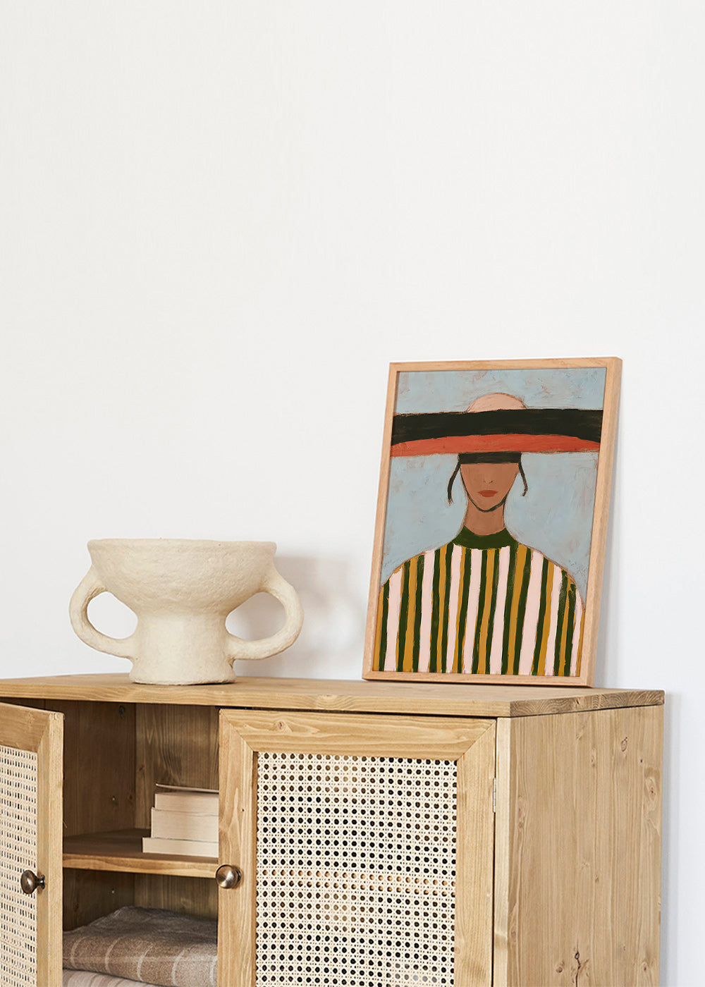 Illustration einer Figur mit breiter Krempe