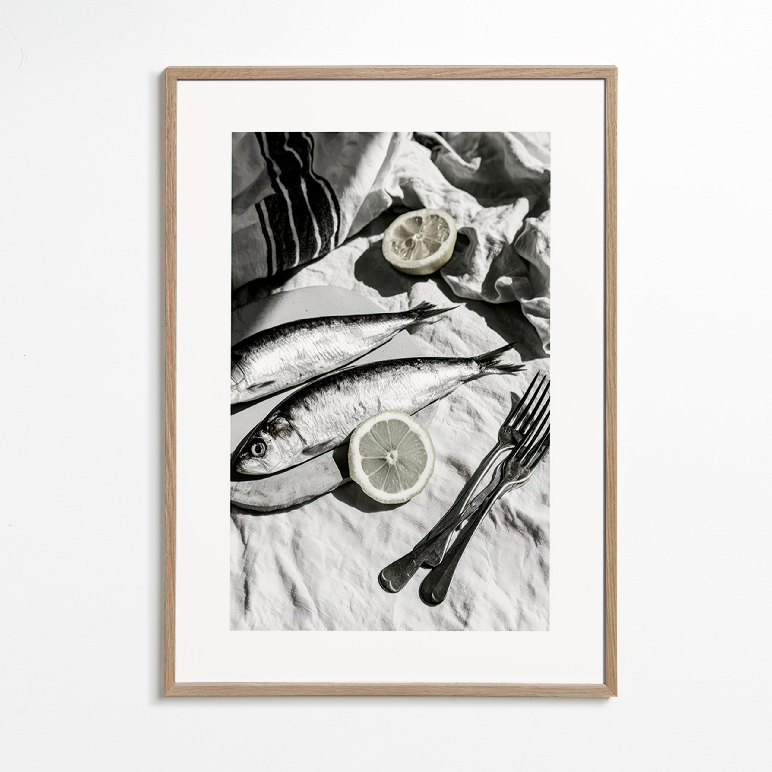 Küchenkunst: Sardinen und Zitrone in Schwarzweiß